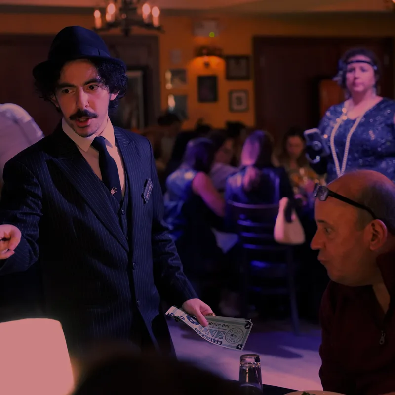 A detective questioning a guest at a Branson show