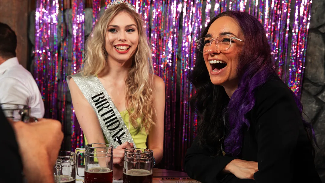 Guests celebrating at a Branson murder mystery party