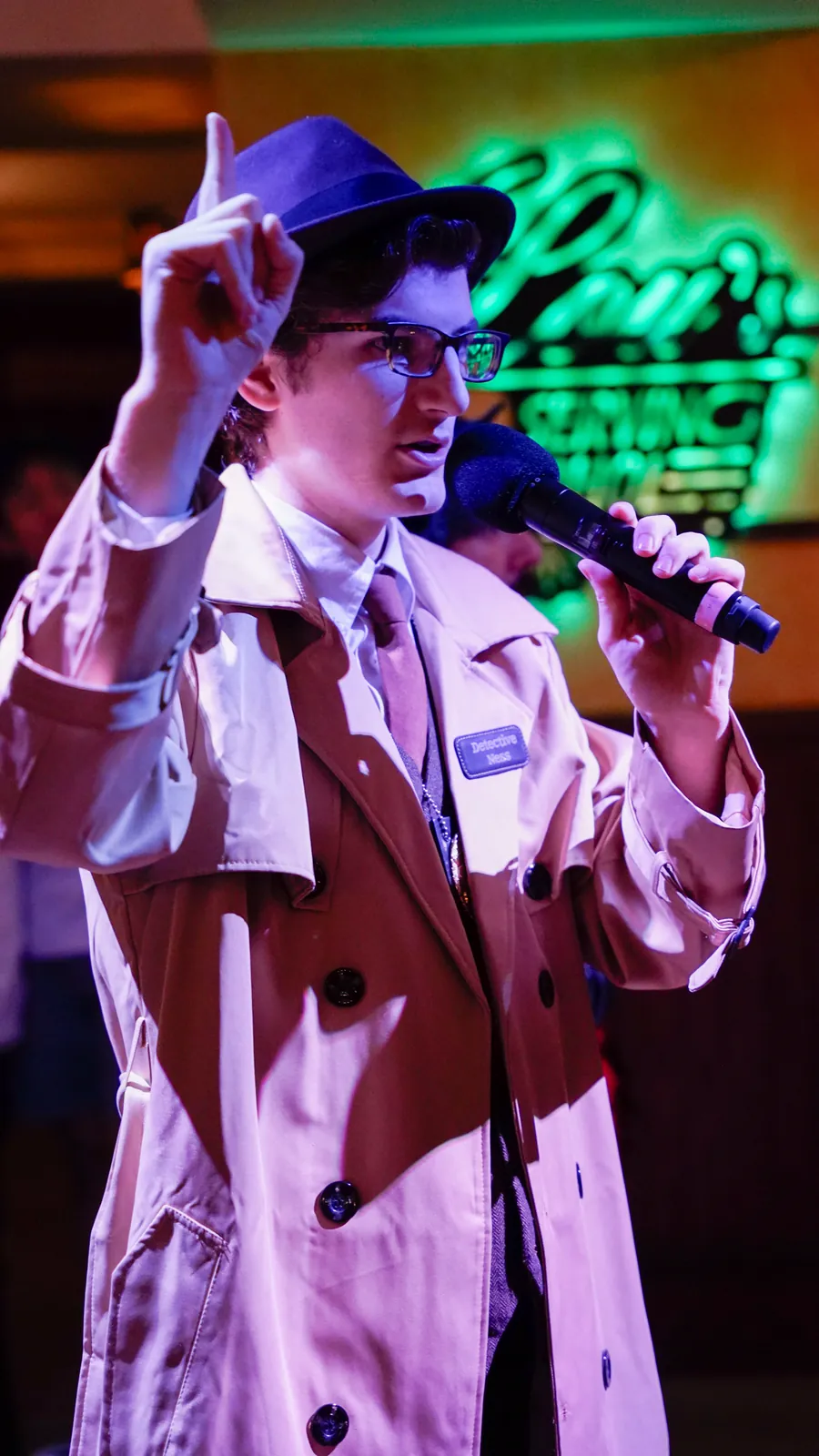A Murder Mystery Company actor working the room at a Branson show